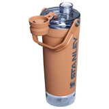 A black Stanley Activate Shaker Bottle with an open tethered cap, showing the lid and carry handle design.
