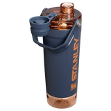 A black Stanley Activate Shaker Bottle with an open tethered cap, showing the lid and carry handle design.
